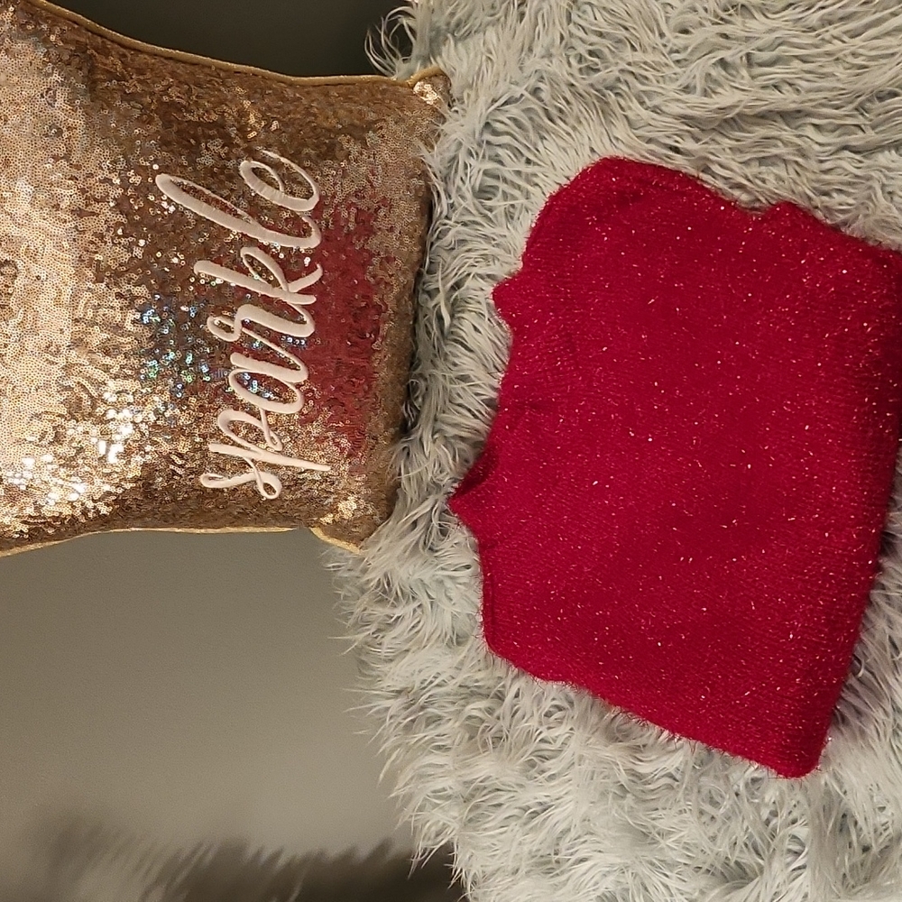 A jazzy red women's cropped sweater with gold flakes embedded throughout.
